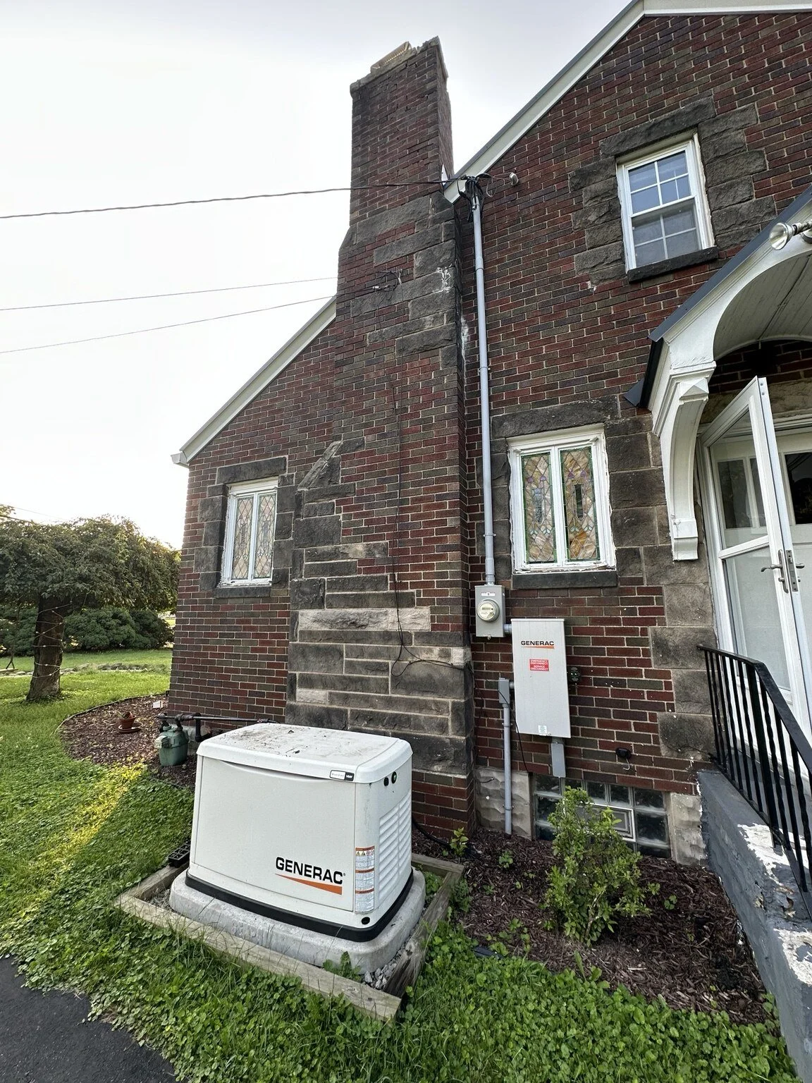 Completed 200-amp electrical service and properly sized Generac automatic transfer switch