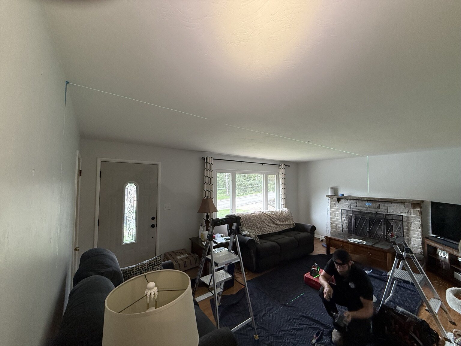 Before: Living-room ceiling marked and carefully laid out before installing a new ceiling fan.