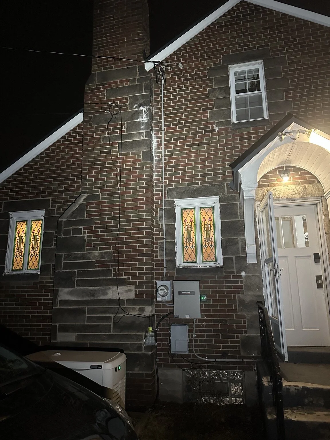 Existing 100-amp service and Generac transfer switch before the 200-amp upgrade