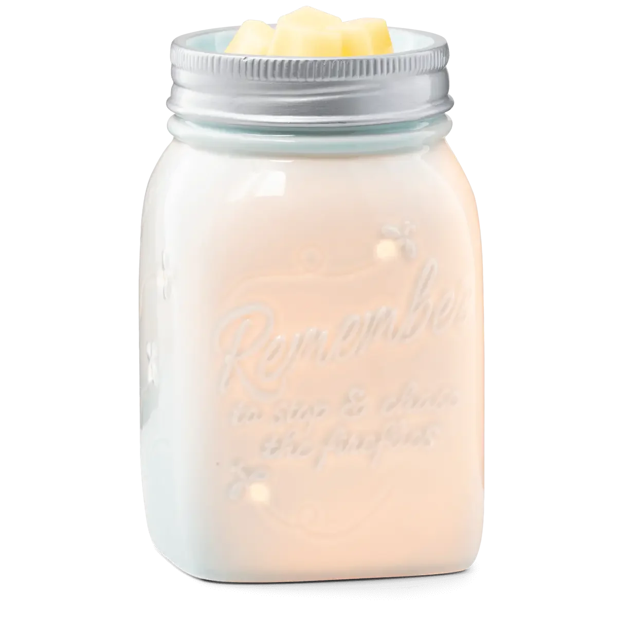 Chasing Fireflies Scentsy Warmer with wax in the dish glowing on a white background