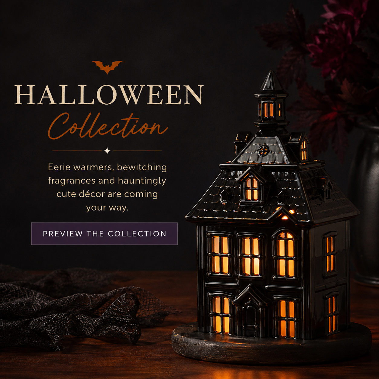 Scentsy Halloween Collection featuring a glowing haunted house warmer styled with spooky seasonal décor.