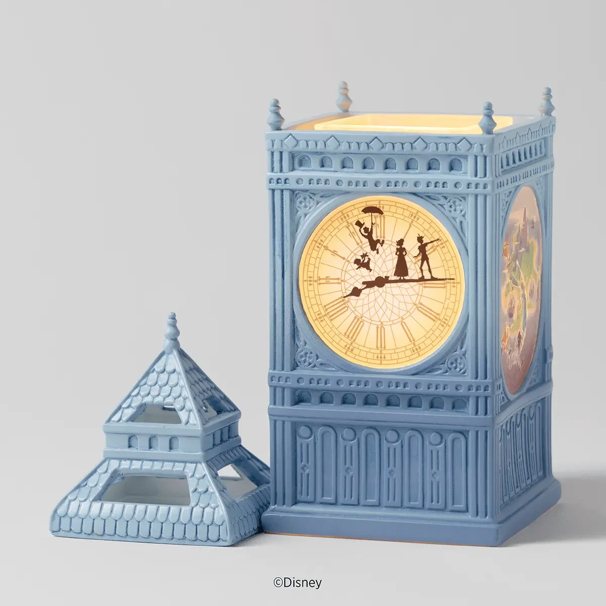Disney Peter Pan Scentsy warmer with lid removed showing wax dish and glowing clock detail