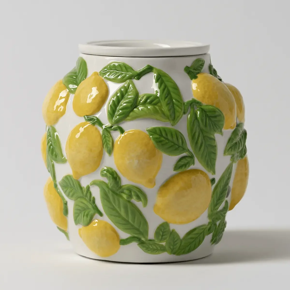 Amalfi Limone Scentsy Warmer with raised lemon and leaf detailing on a white ceramic warmer inspired by the Amalfi Coast