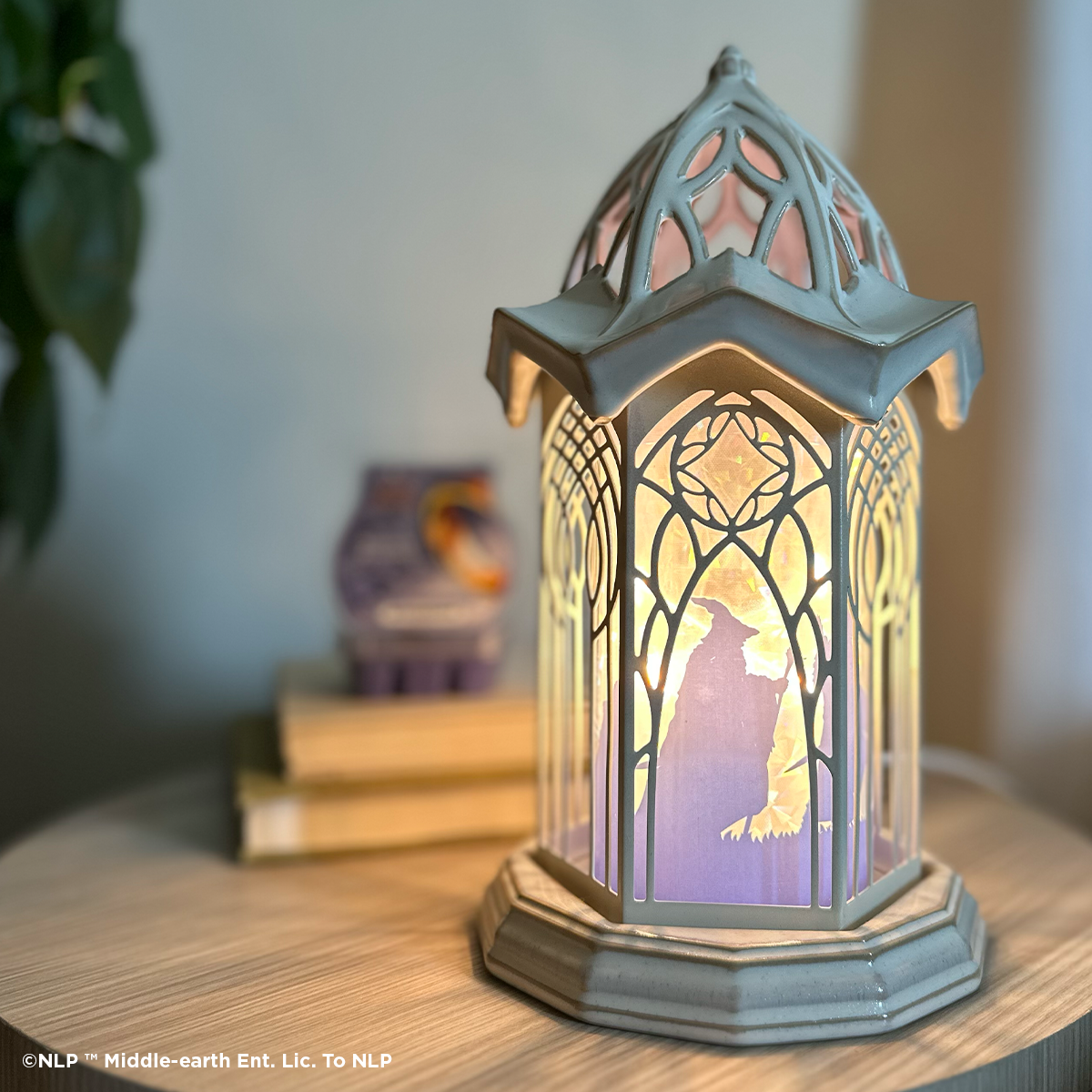 The Lord of the Rings Rivendell Scentsy Warmer illuminated with Fellowship silhouette design