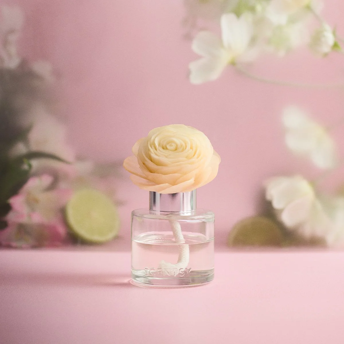 Scentsy Bergamot & Tuberose Prim Posy Fragrance Flower - Stylized with a pink background