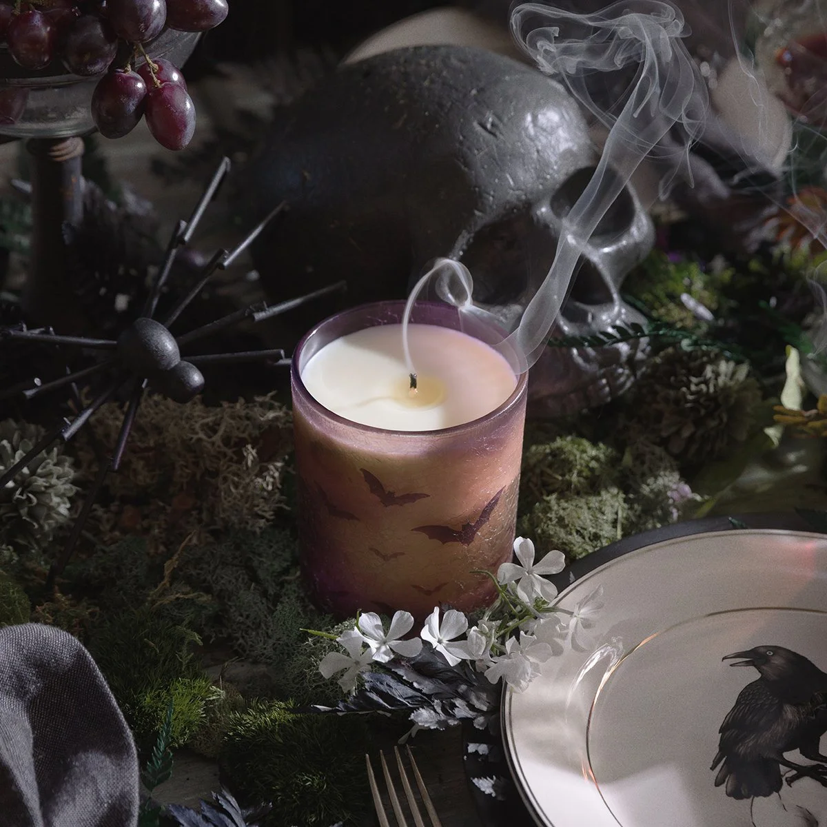 Black Luna Night Scentsy Scented Candle with bat design styled in dark Halloween décor.