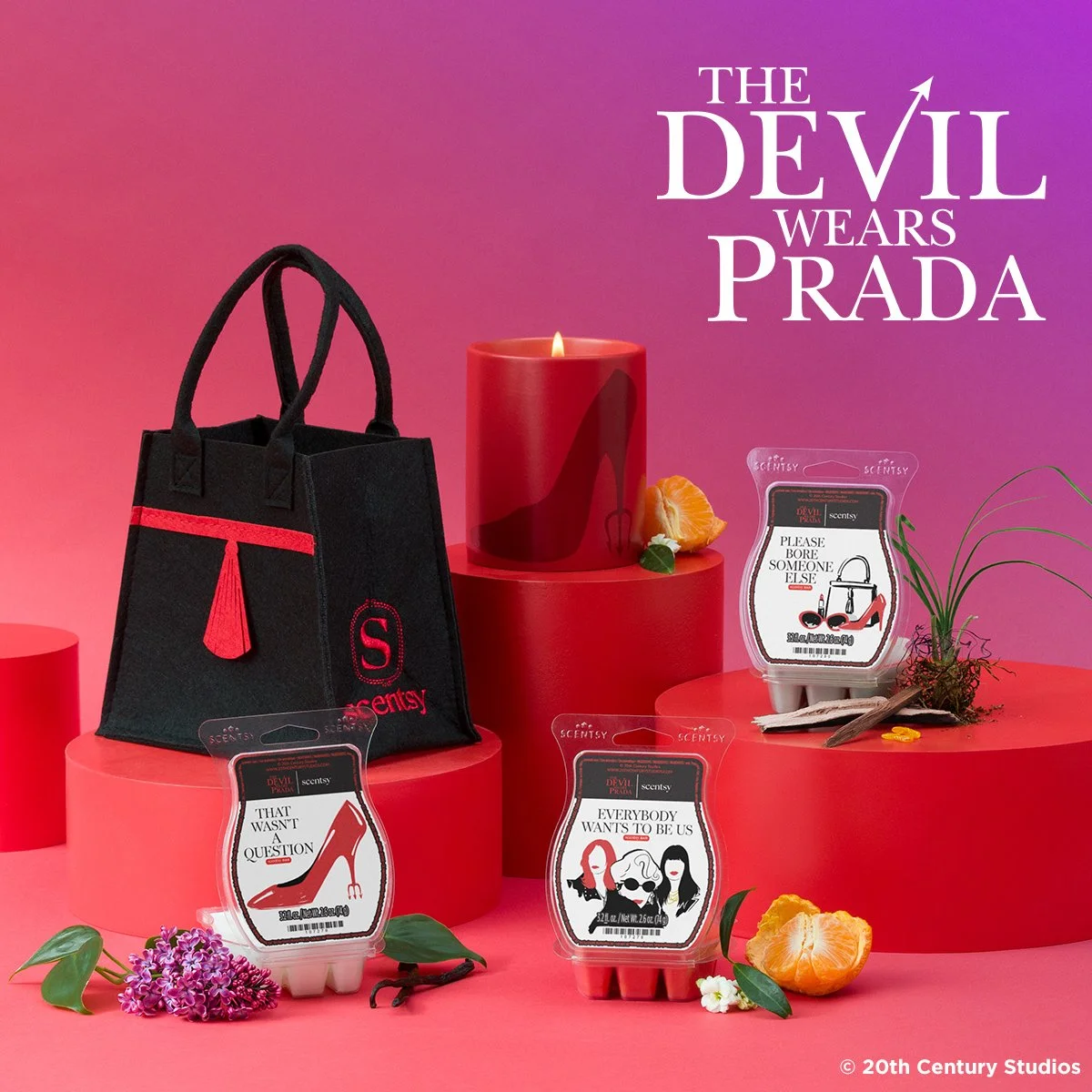 Scentsy Devil Wears Prada collection with wax bars candle and black felt bag on pink background