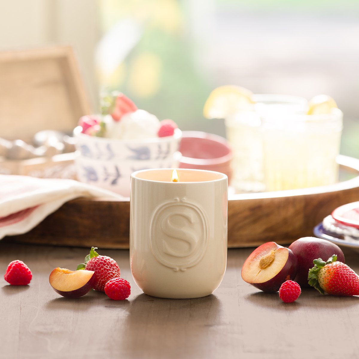 Red, White & Sparkle Scentsy Candle featuring sparkling berries, sugared plums and vanilla in a cream ceramic vessel styled