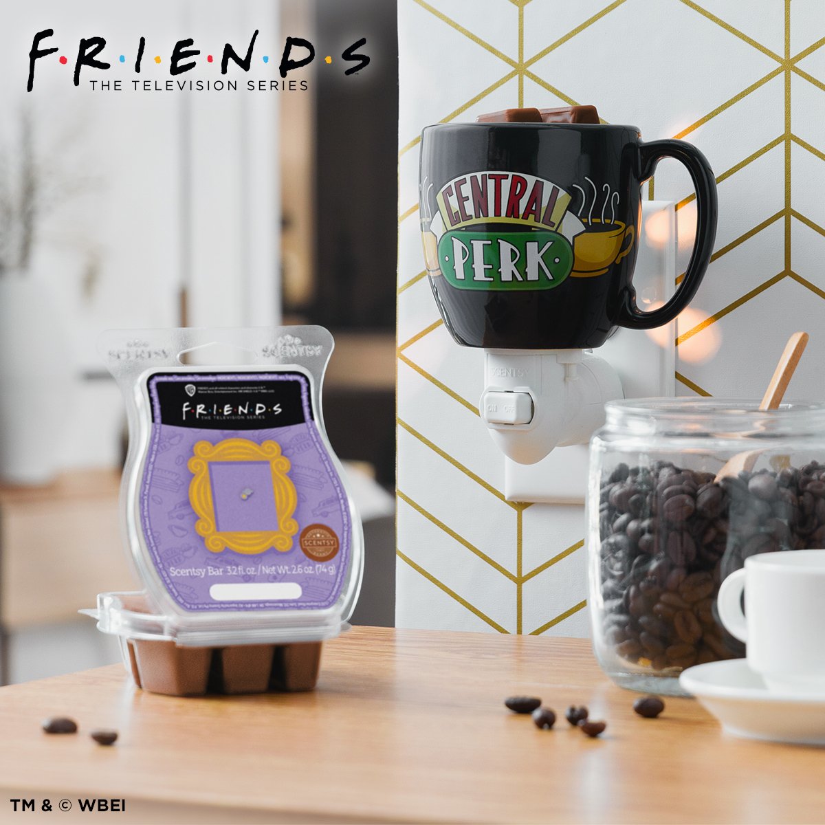 Friends Central Perk Scentsy Mini Warmer glowing in a cozy kitchen setting with the friends wax bar and coffee