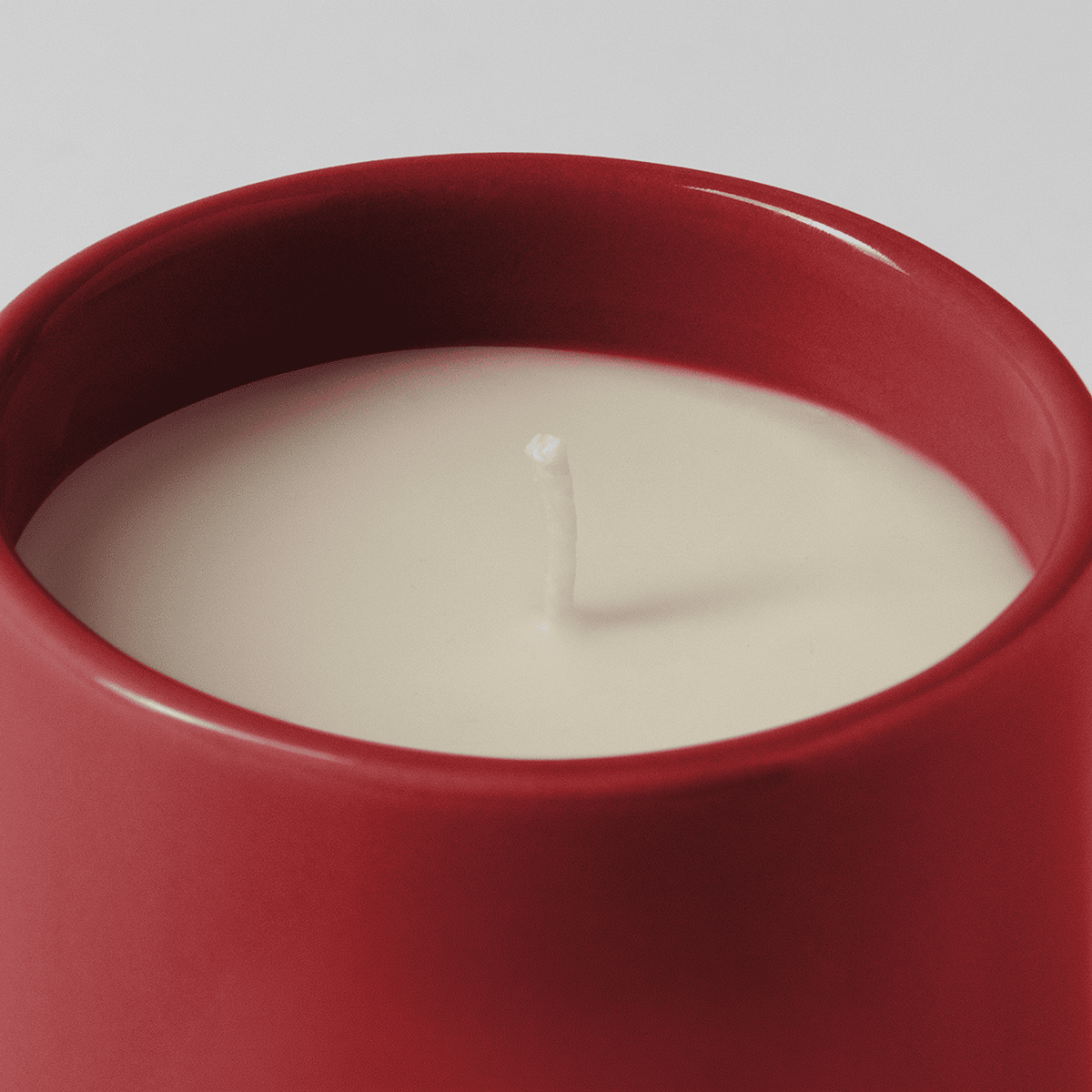 Top view of Scentsy Everybody Wants to Be Us candle showing single wick and wax surface