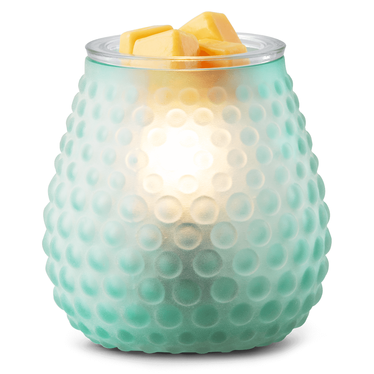 Bubble Blue Scentsy Warmer with wax in the dish, glowing softly