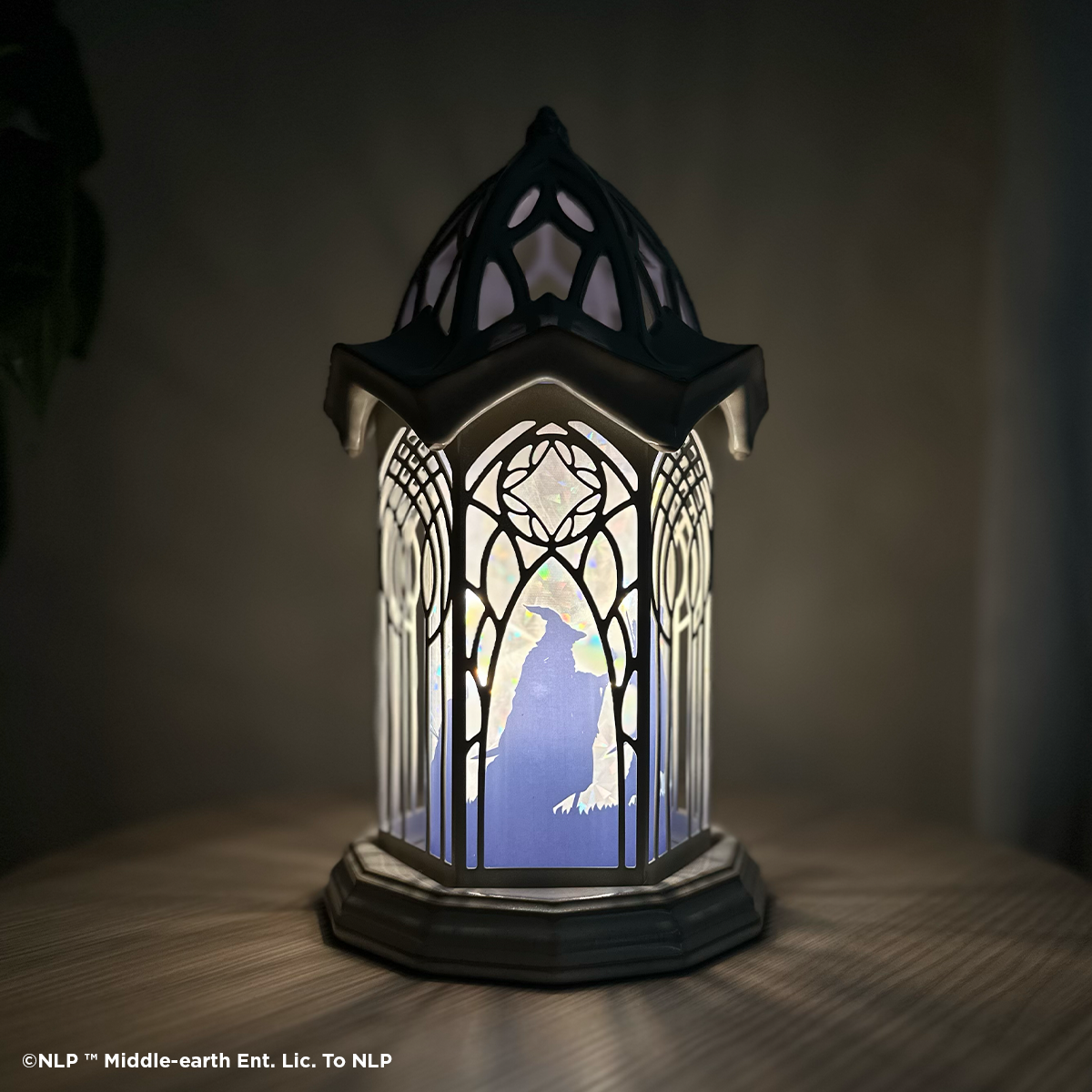 The Lord of the Rings Rivendell Scentsy Warmer illuminated in a dark room