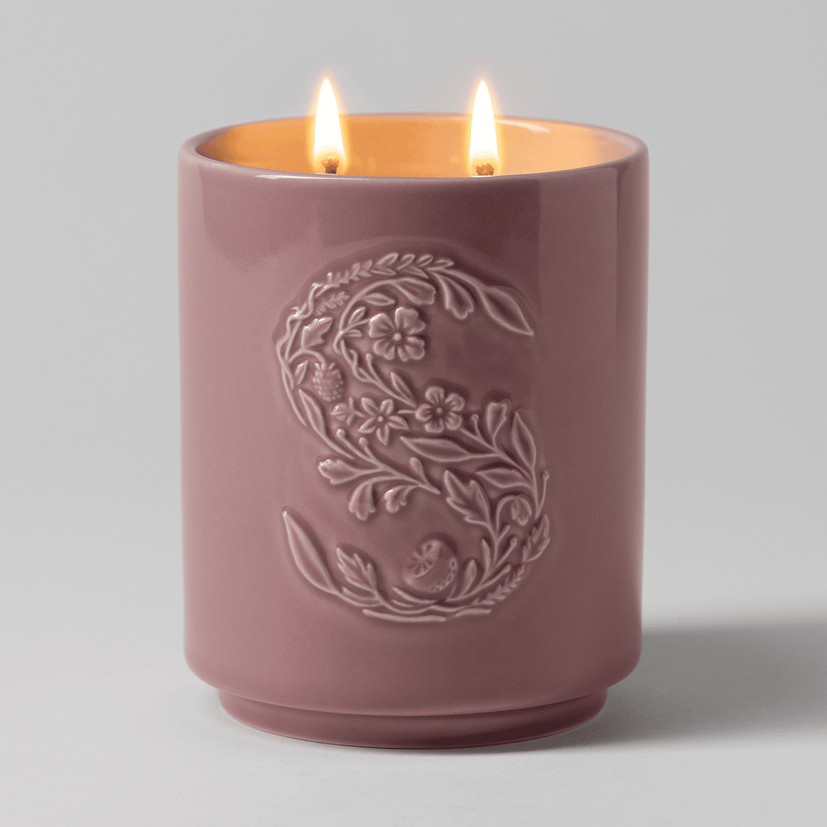 Cashmere Vanilla Sugar Scentsy Candle lit with glowing wicks creating a warm, inviting ambiance