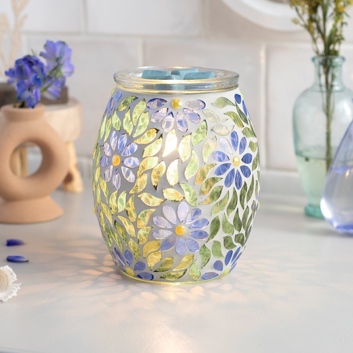 Periwinkle Petals Scentsy Warmer styled in a bright, artistic living space
