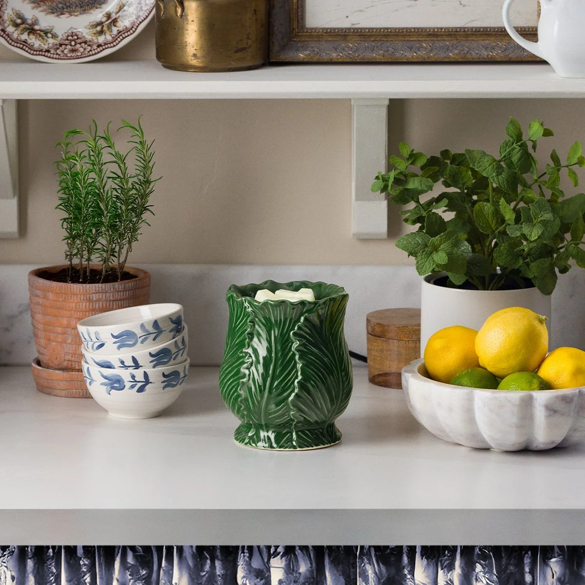 Etched Sage Scentsy element warmer styled on a kitchen shelf with classic décor