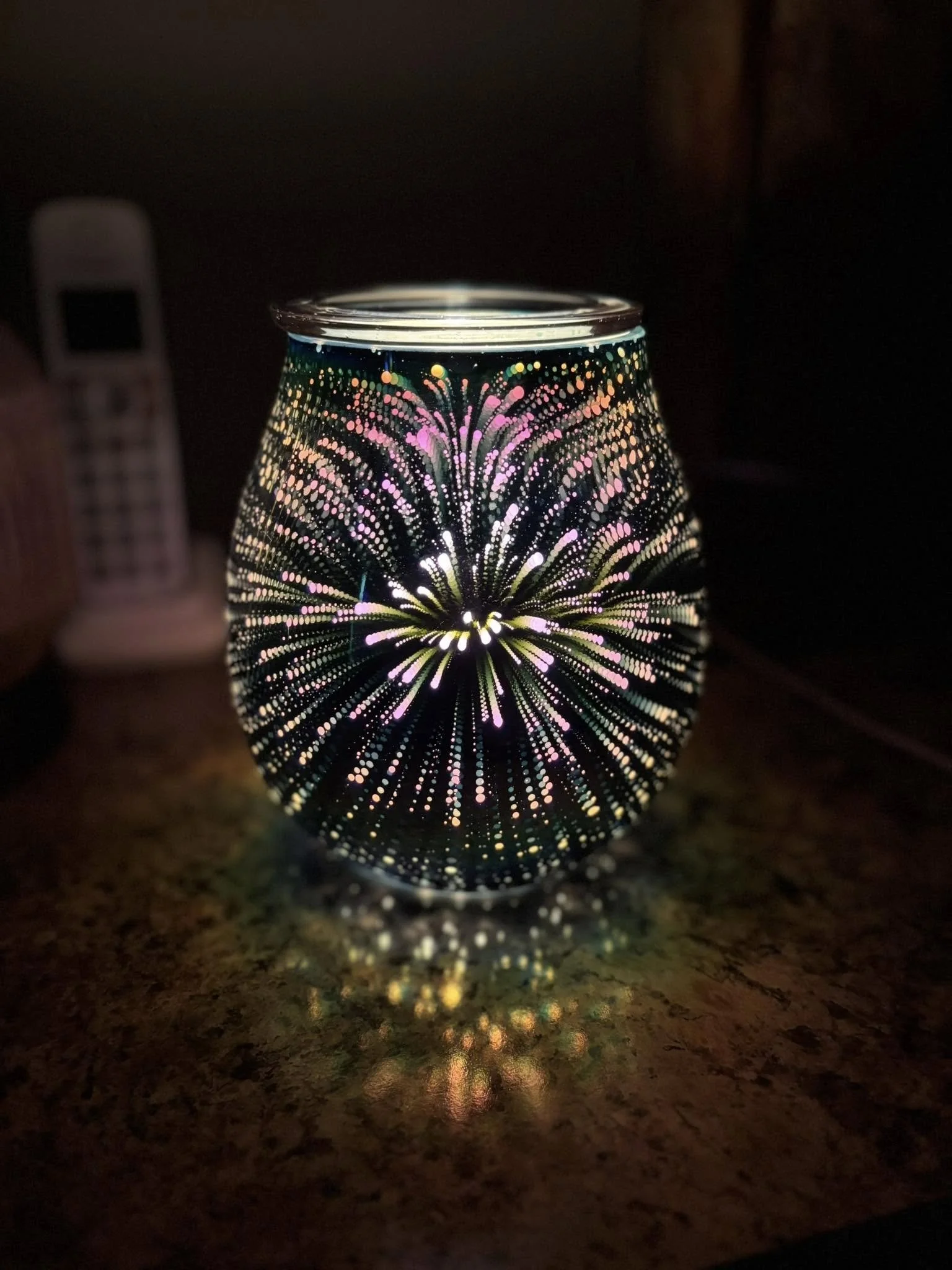 Nova Scentsy Warmer illuminated showing unique light and color display