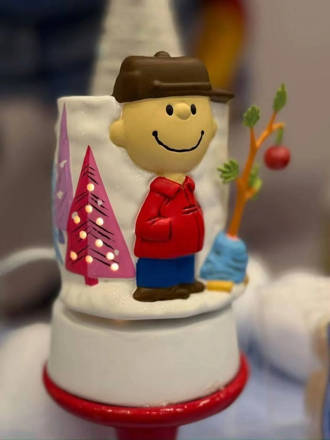 Snoopy winter Scentsy Warmer featuring Snoopy bundled in a blue puffer coat with Woodstock
