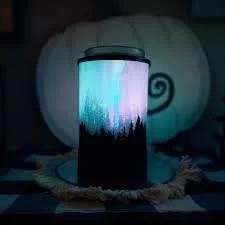 Polar Panorama Scentsy Warmer glowing showing rotating LED lights in the dark