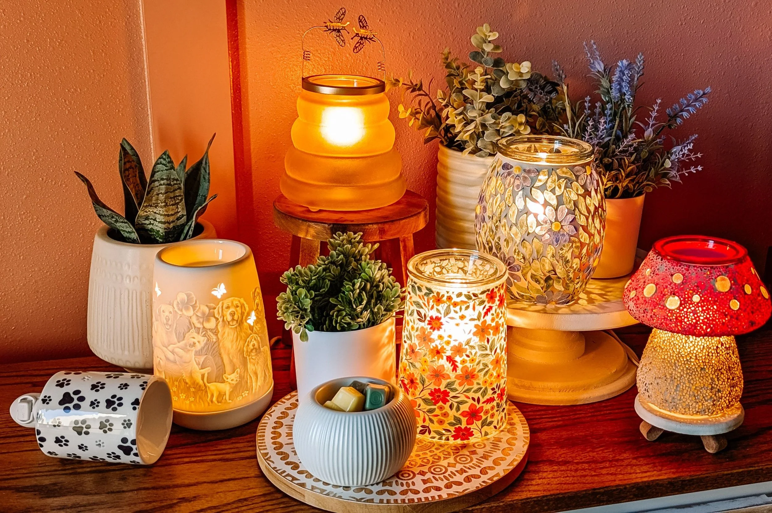 Warm, glowing Scentsy warmers styled in an elevated home décor scene, supporting Scentsy customers across Newfoundland and Labrador