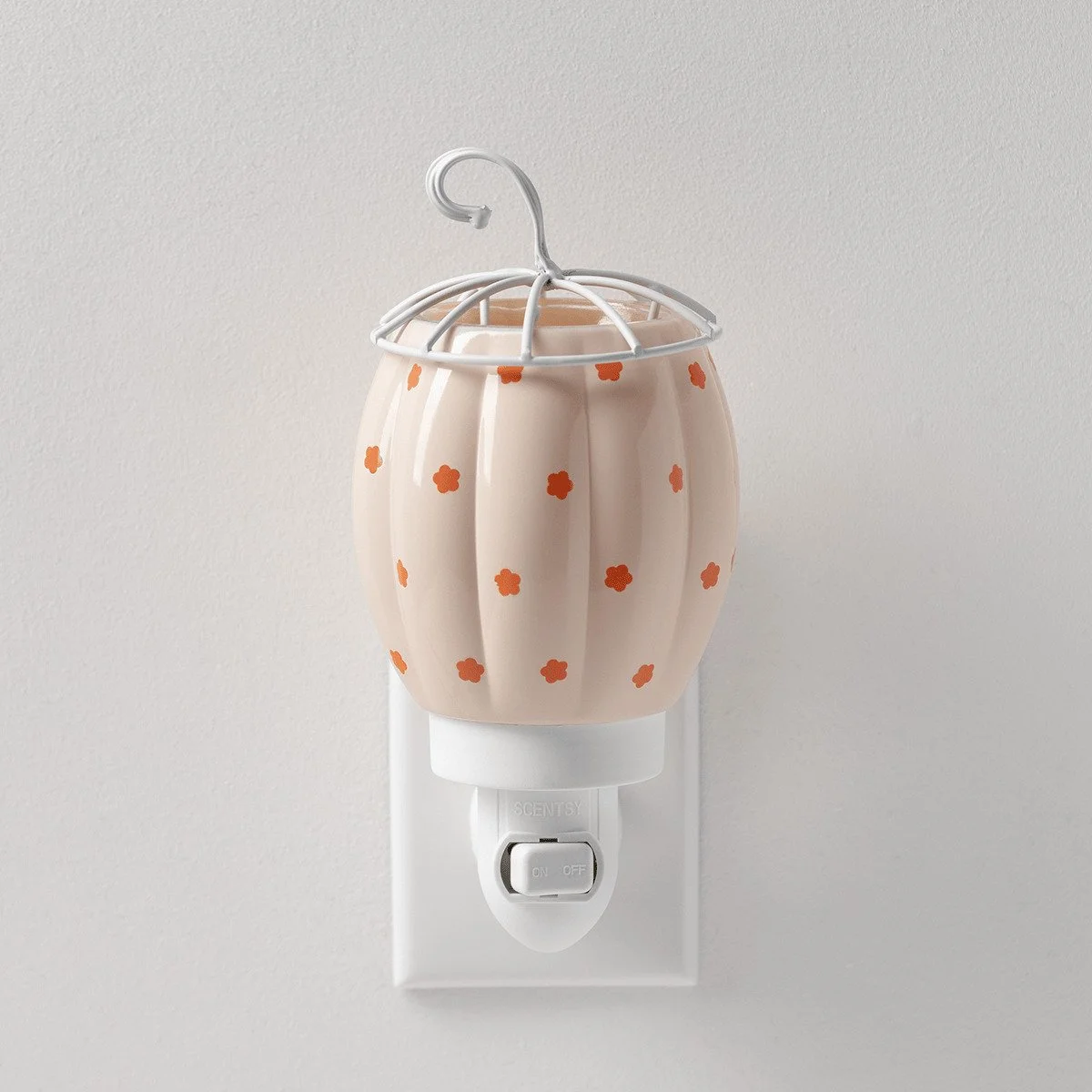 Pumpkin Posy Scentsy Mini Warmer with soft cream pumpkin design and orange flowers
