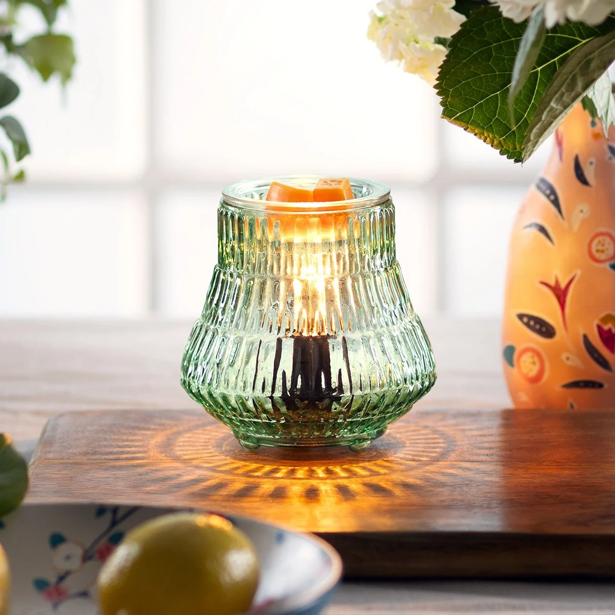 Moroccan Mint Scentsy Warmer styled in a warm, globally inspired living space