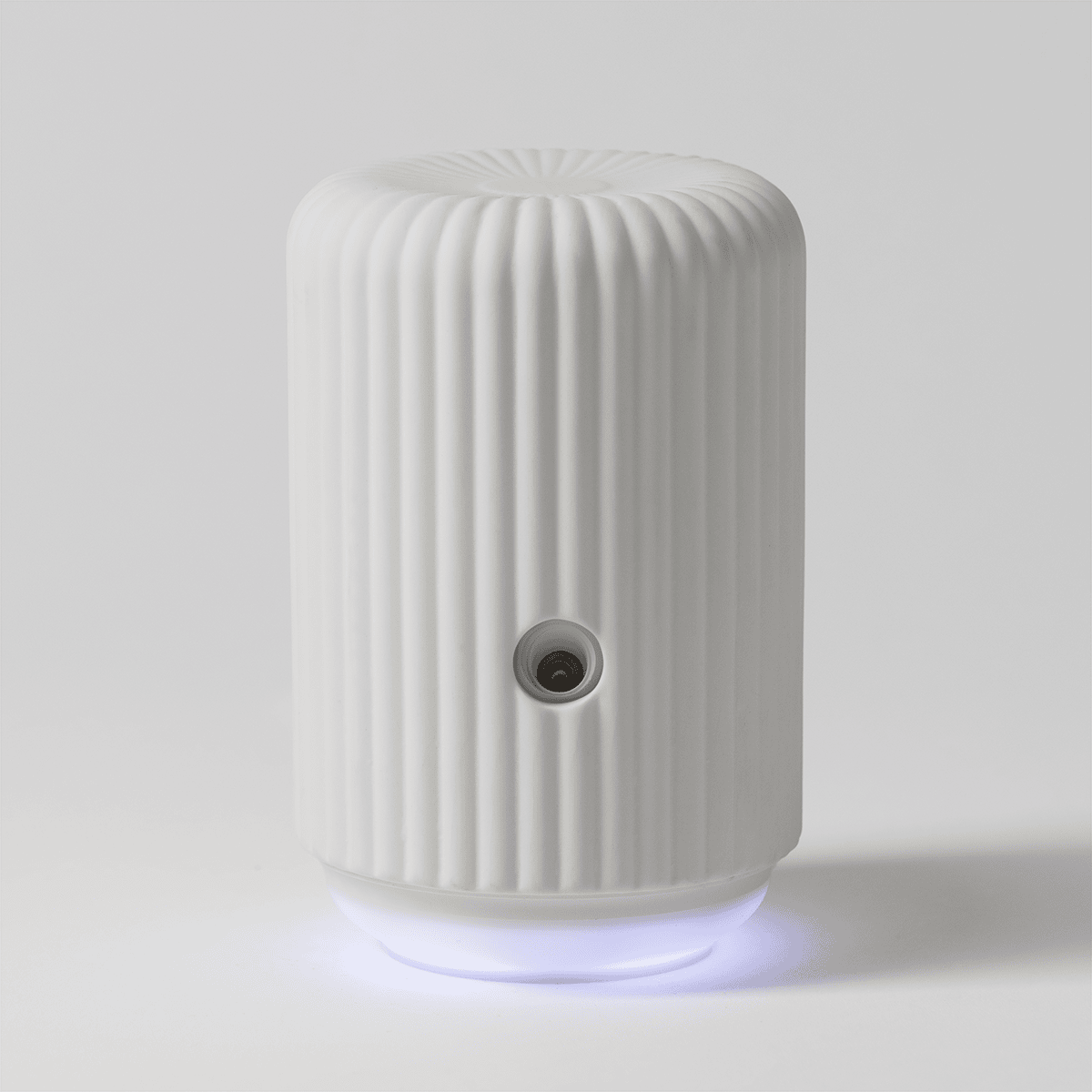 Scentsy Solo Diffuser turned on and releasing fragrance mist