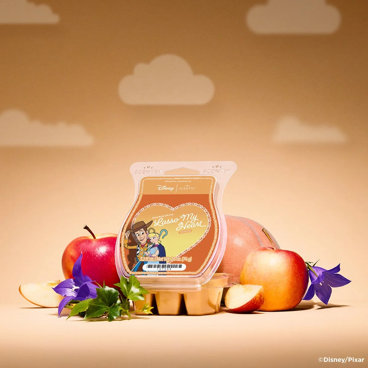 Disney Woody & Bo Peep Lasso My Heart Scentsy Wax Bar styled with peach, apple, and wildflowers to reflect the fragrance notes