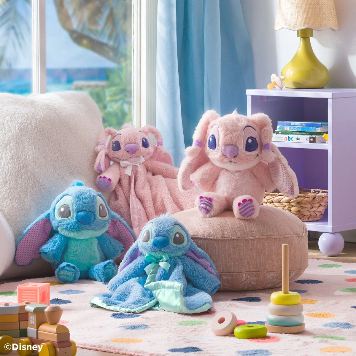 Disney Lilo & Stitch Scentsy Baby Buddies and Blankie Buddies featuring Stitch and Angel plush characters displayed together in a bright nursery.