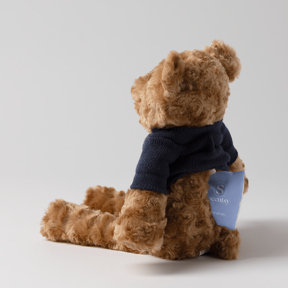 Back view of Banner the Bear Scentsy Buddy showing the hidden pocket designed to hold a Scentsy Scent Pak