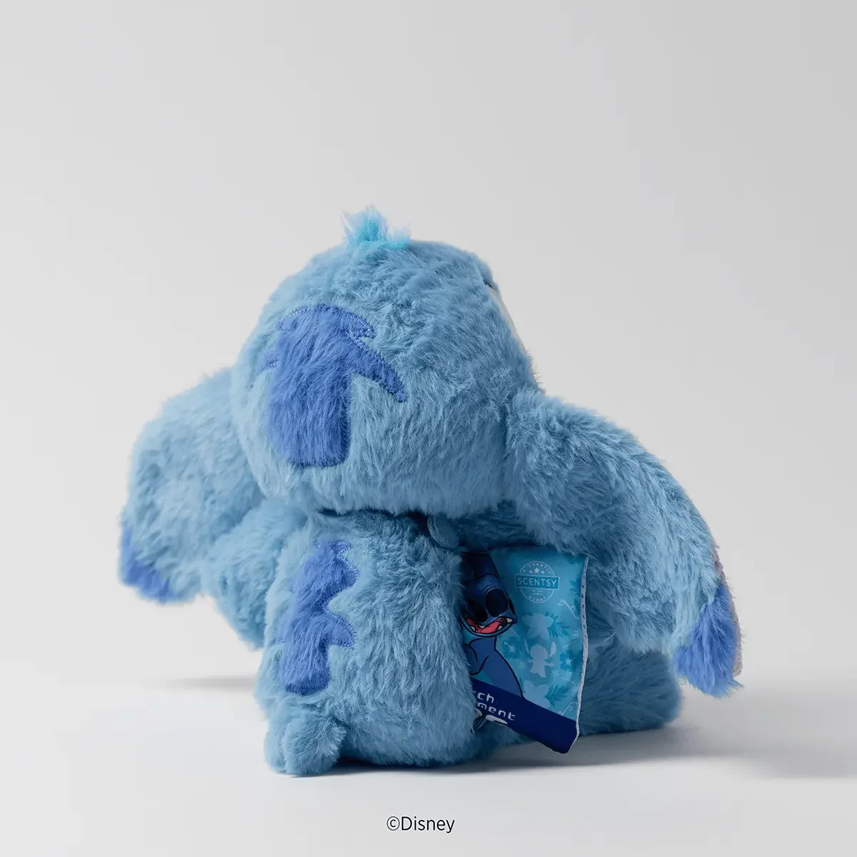 Back view of the Disney Stitch Scentsy Baby Buddy showing the Disney Stitch: Experiment 626 Scent Pak pocket