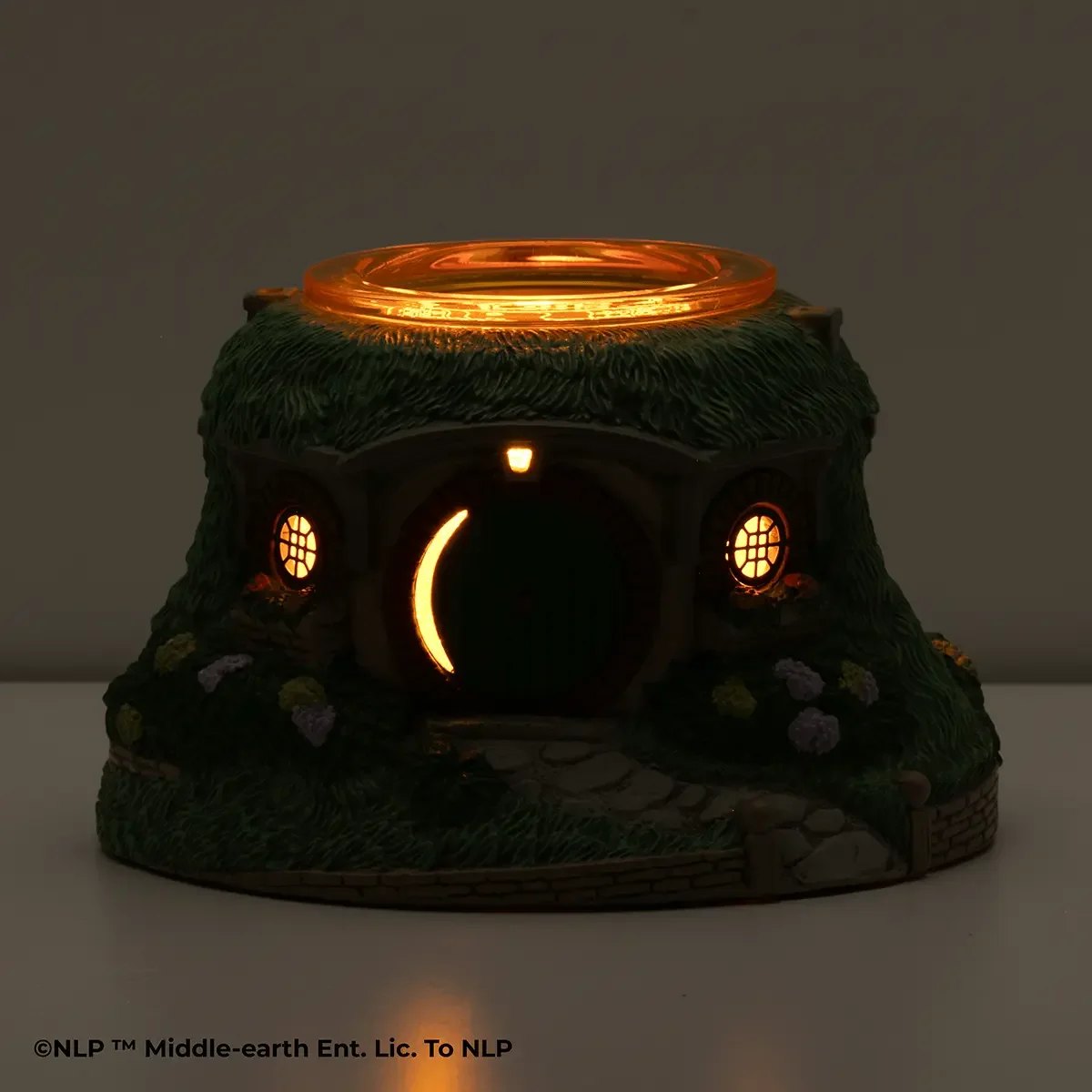 The Lord of the Rings Bag End Scentsy Warmer glowing in the dark