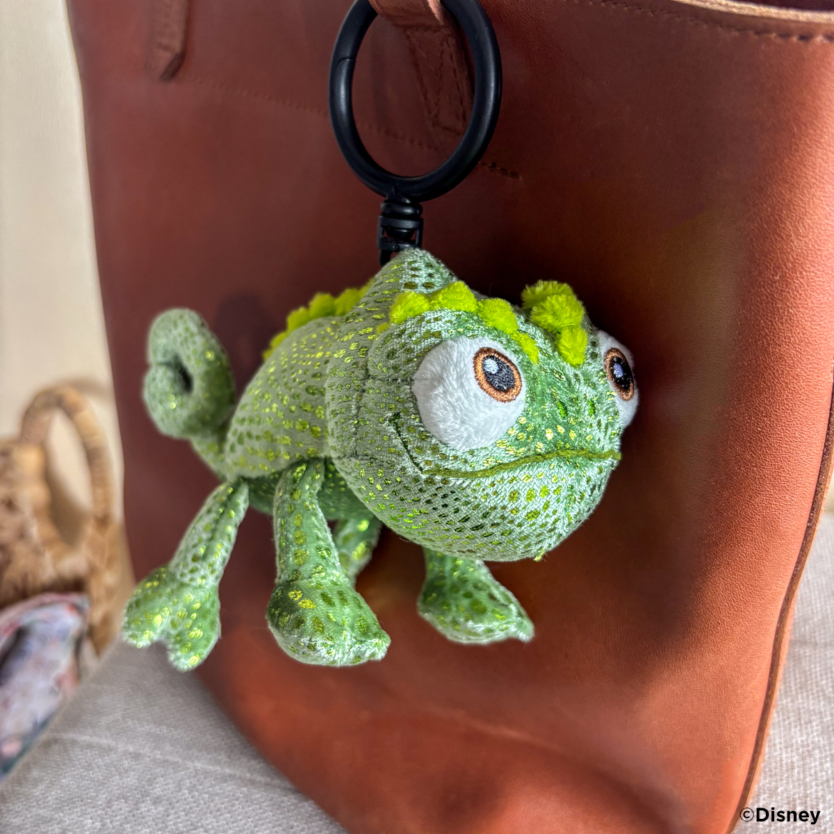 Disney Pascal Scentsy Buddy Clip backpack accessory close up image