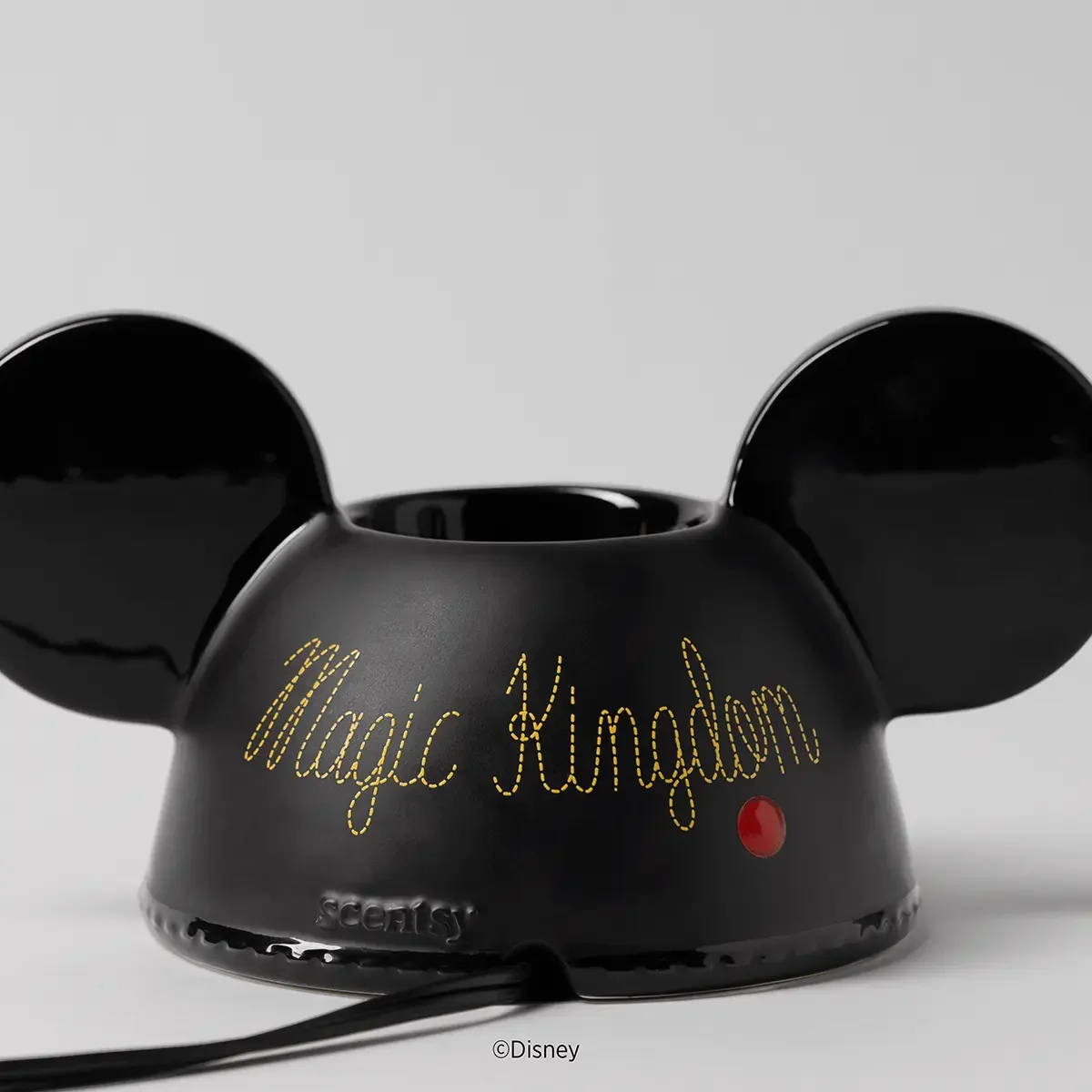 Back of Walt Disney World® Embroidered Mickey Ears Scentsy Warmer with raised Magic Kingdom embroidery-style detail