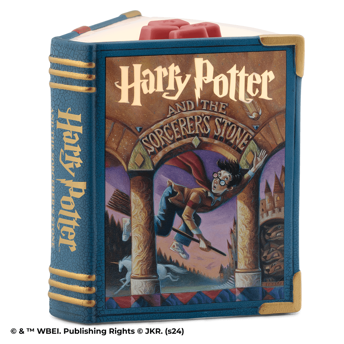 Harry Potter and the Sorcerer’s Stone Scentsy Warmer shaped like a half-opened book glowing with magical light