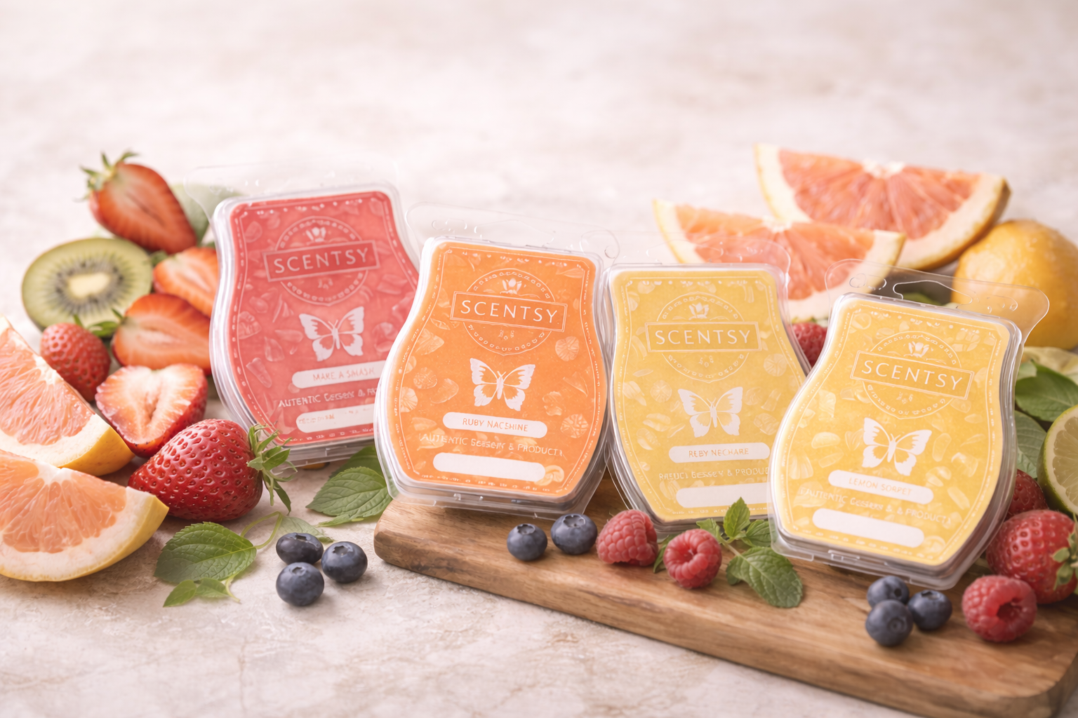 Fruity Scentsy wax bars styled with fresh strawberries, citrus, mango and berries on a neutral surface