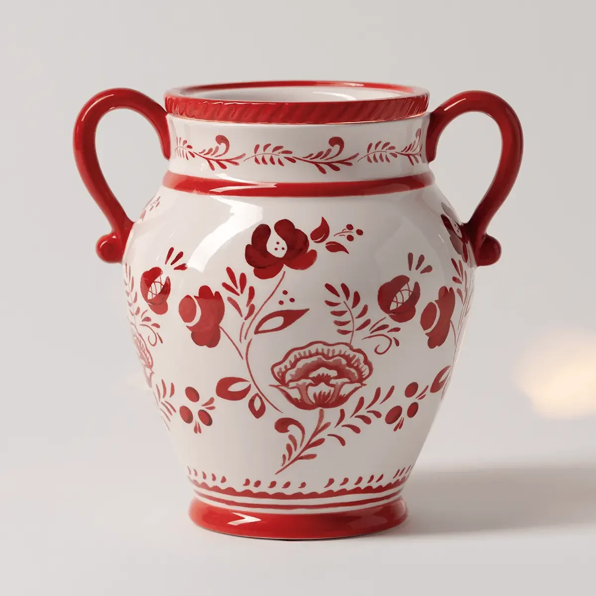 La Vita Rosa Scentsy Warmer featuring a white ceramic finish with hand-painted red floral artwork and twin handles, exclusive to the July 2026 Italian Summer Monthly Edit.