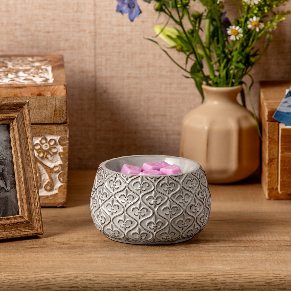 Fleur-De-Lis Scentsy Warmer styled in a classic home setting