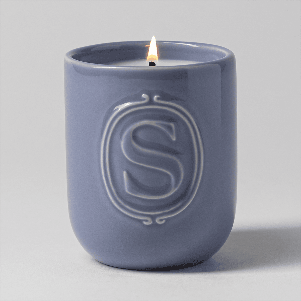 Luna Scentsy Candle lit with a flame