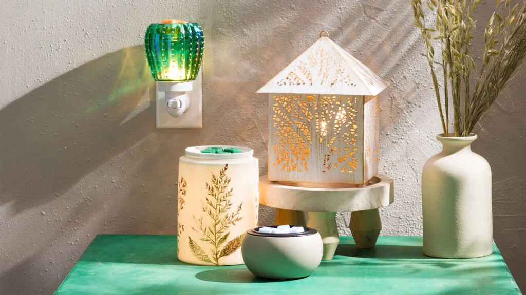 Scentsy warmers glowing in a cozy lifestyle setting, providing personalized home fragrance support across Nova Scotia