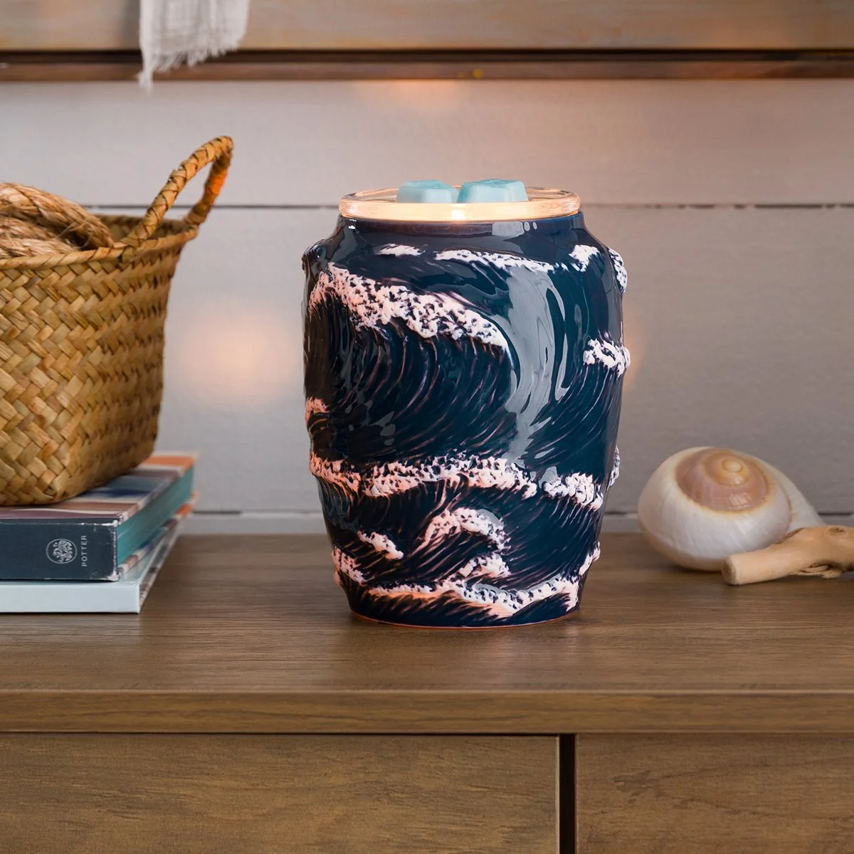 Scentsy Ocean Crest warmer on table styled with coastal decor
