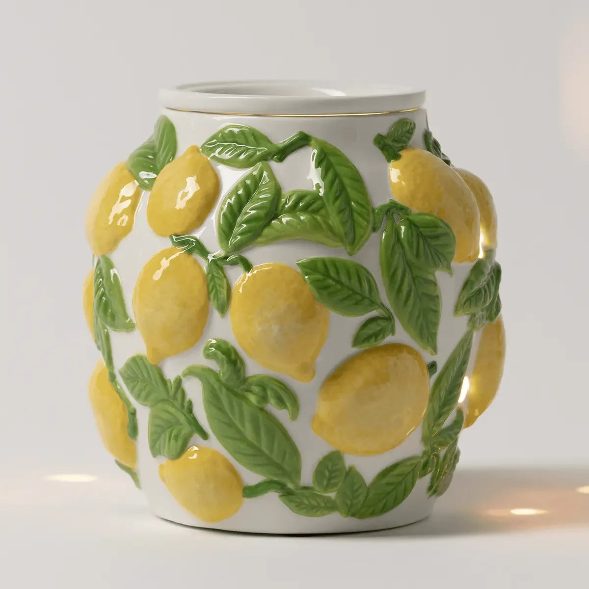 Amalfi Limone Scentsy Warmer featuring raised yellow lemons and green leaves on a white ceramic warmer, part of the July 2026 Italian Summer Monthly Edit.