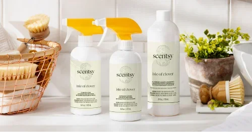 Scentsy Isle of Clover cleaning products displayed on a kitchen counter