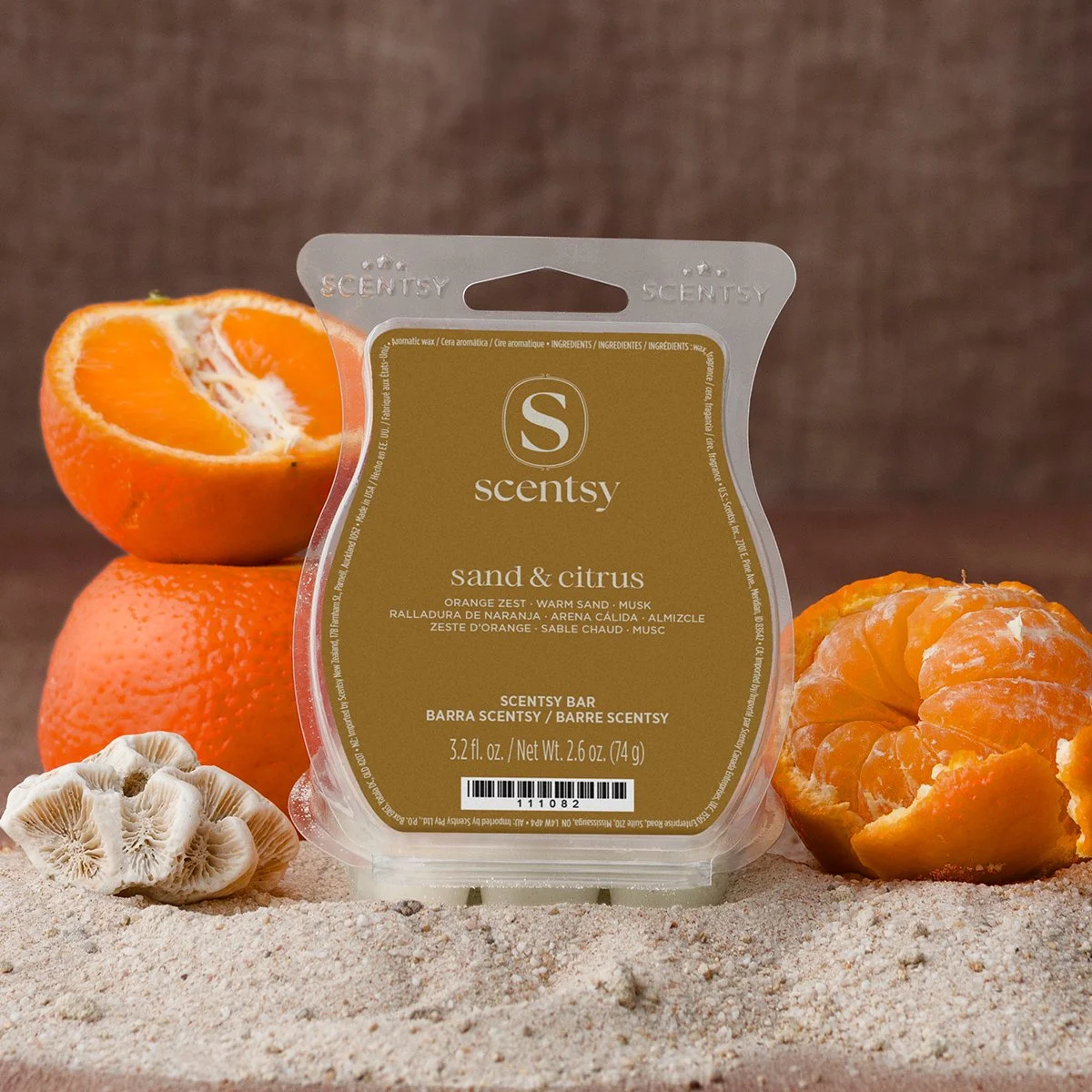 Scentsy Sand and Citrus wax bar with orange zest warm sand and musk fragrance on beach