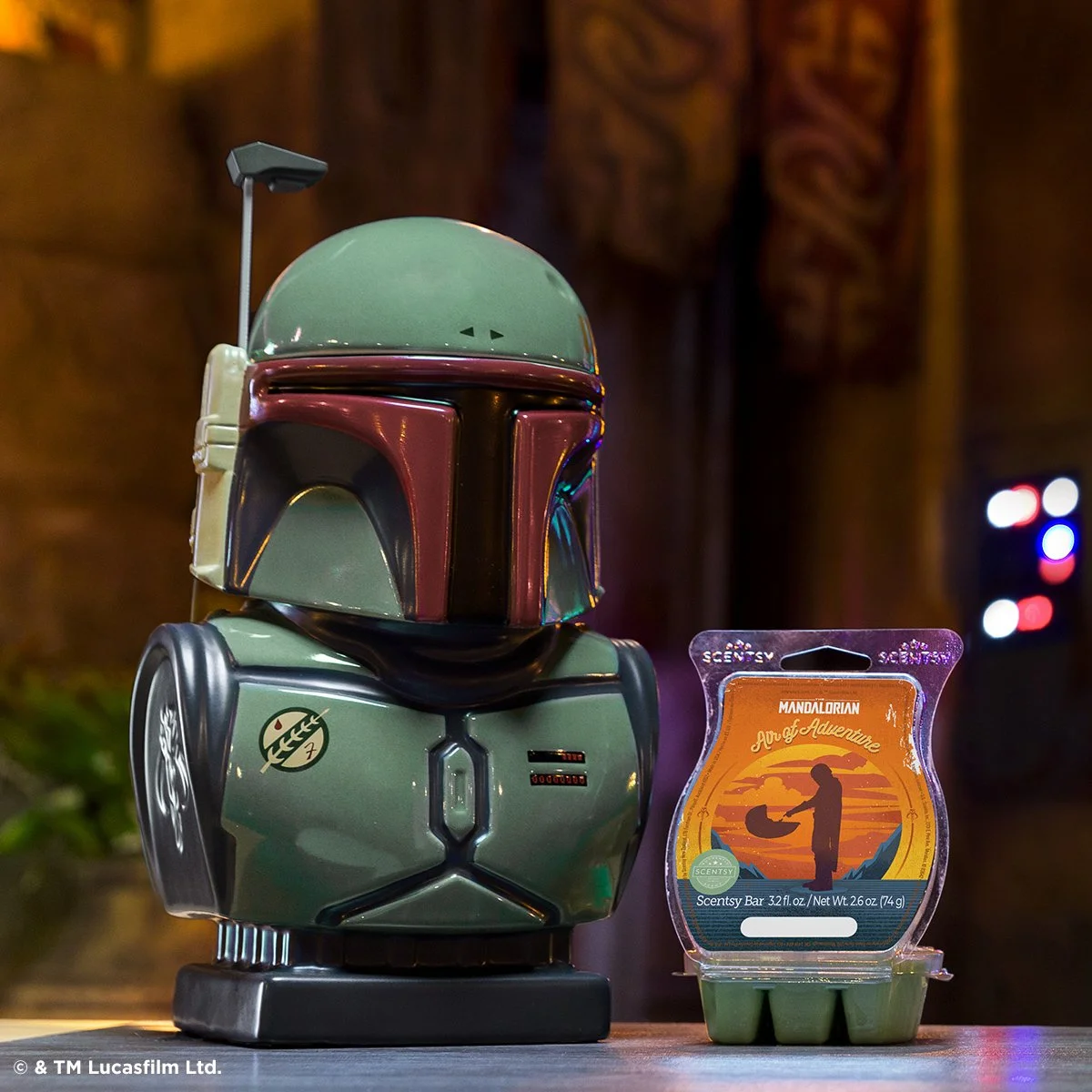 Boba Fett Scentsy Warmer displayed with Mandalorian Air of Adventure wax bar in a dimly lit Star Wars themed setting