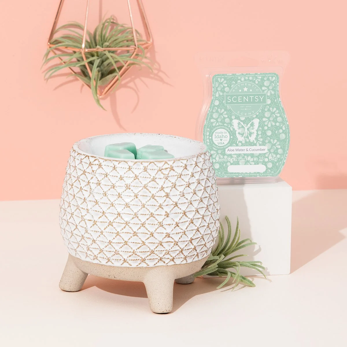 Take A Stand Scentsy Warmer styled in a bright room with a wax bar