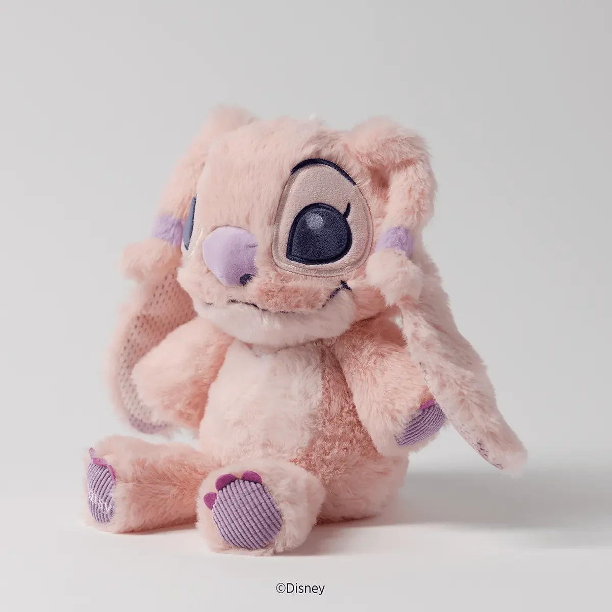 Side view of the Disney Angel Scentsy Baby Buddy plush