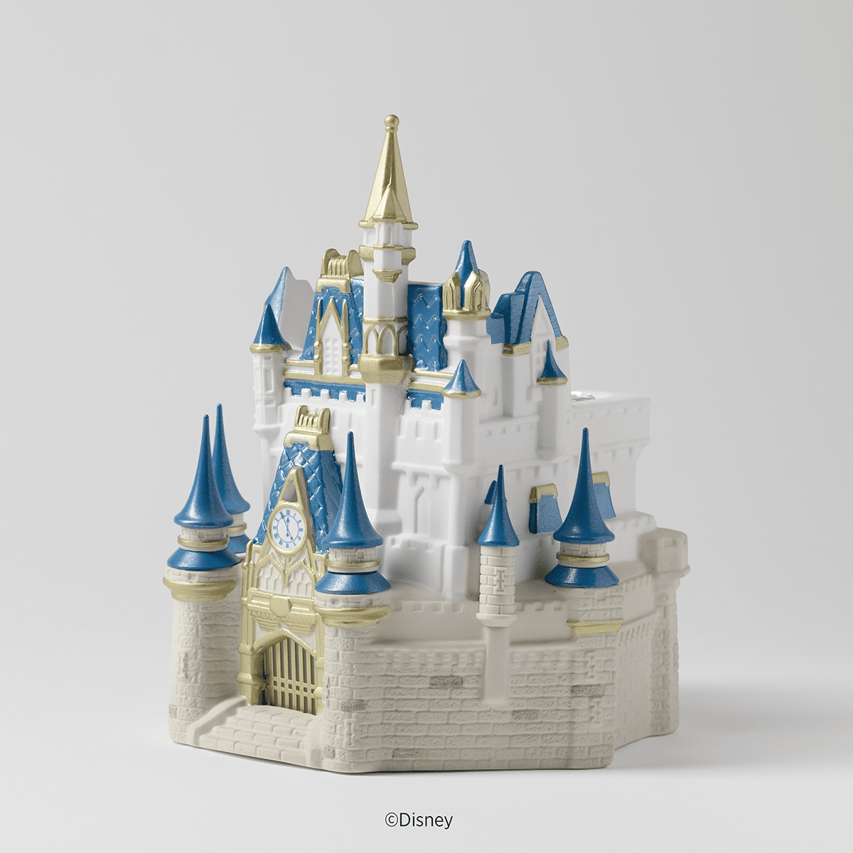 Side view of the Disney Cinderella Castle Scentsy Warmer showing blue turrets and detailed castle architecture