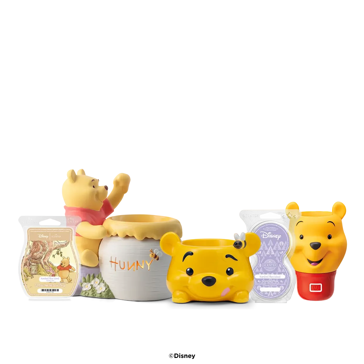 Ultimate Disney Winnie the Pooh Scentsy Bundle featuring Just a Smackerel of Hunny Warmer, Warm Fuzzies Warmer, Winnie the Pooh Air Mini+, Hundred Acre Wood Scentsy Bar and Scentsy Pod Twin Pack.