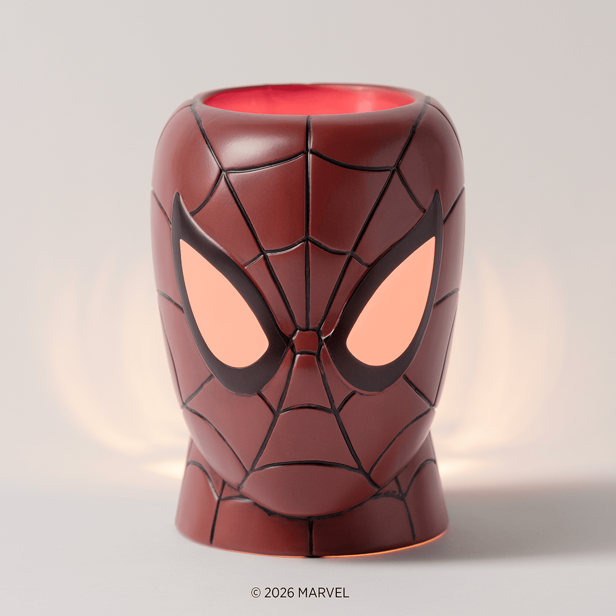 Amazing Spider-Man Scentsy Warmer illuminated to showcase the glowing eye design