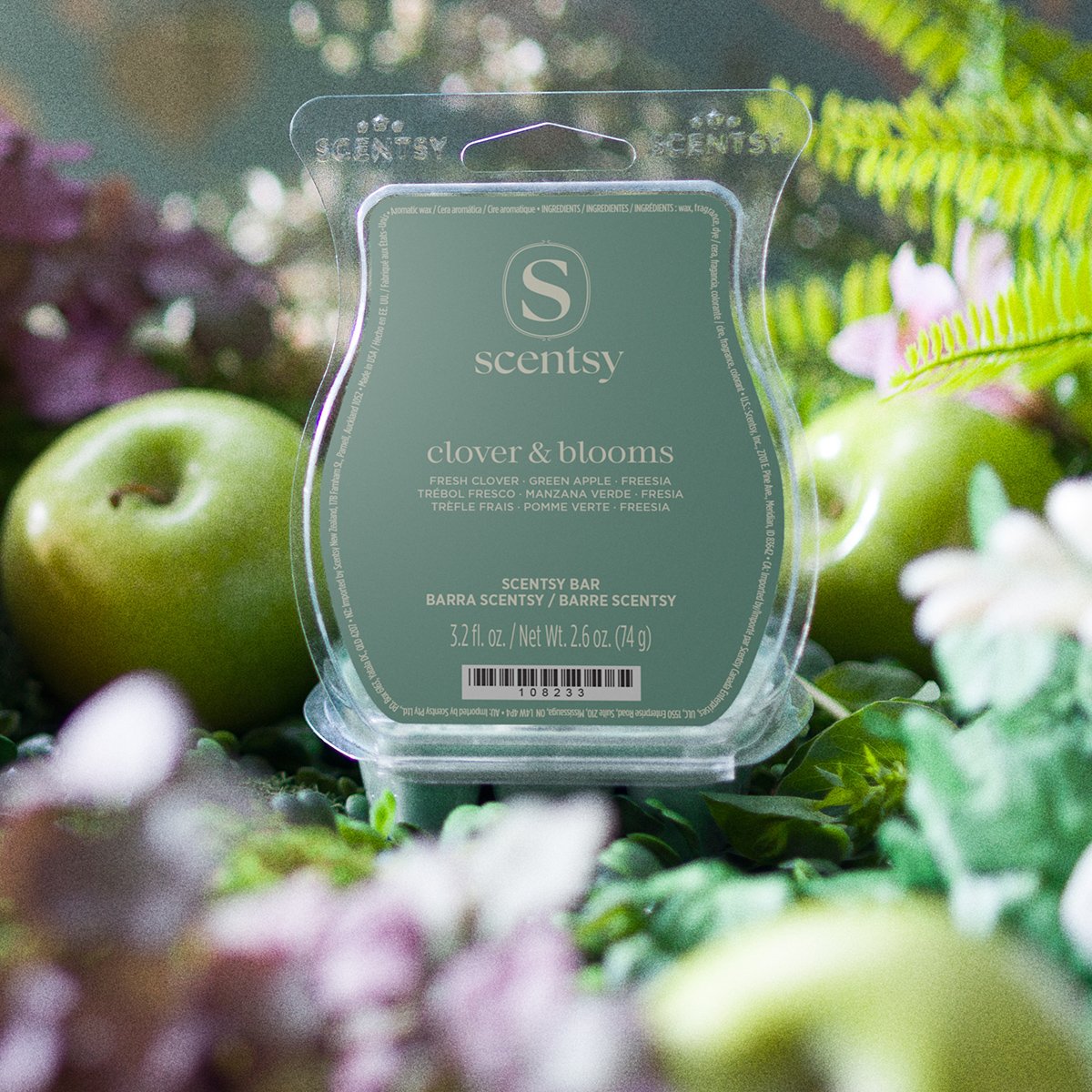 Water Lily & Verbena Scentsy Bar shown in a garden-inspired setting with florals and citrus, featuring water lily, citron, and verbena fragrance notes from the March Edit Garden Collection.